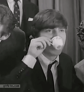 reverse-1309280747_johnn_lennon_drinks_coffee Café Coffee John Lennon