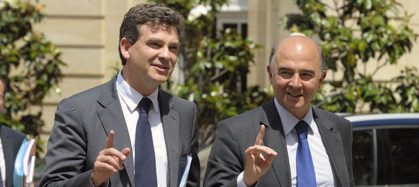 french-industrial-recovery-minister-montebourg-and-economy-finance-and-trade-minister-moscovici-arrive-for-a-meeting-at-the-hotel-matignon-in-paris_1067359
