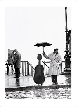 img_Un-musicien-sous-la-pluie--Maurice-Baquet--Paris--1957_Robert-DOISNEAU_ref~160.002399.00_mode~zoom